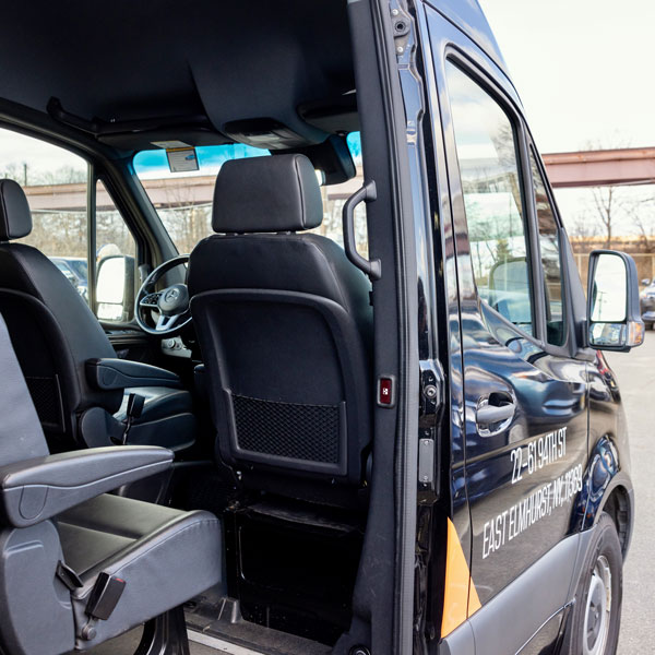 view inside shuttle van with side door open