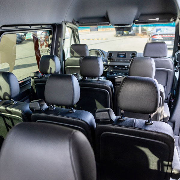 view of seats in vehicle interior from the back