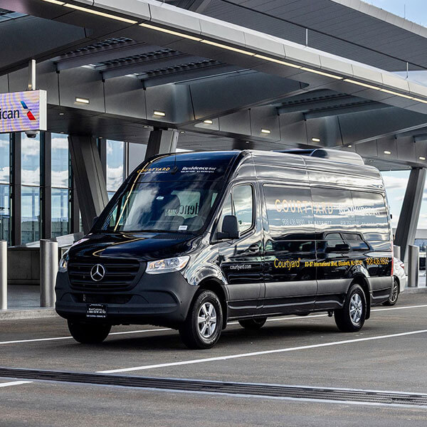 shuttle van parked at airport